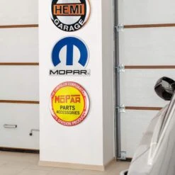 American Art Décor™ 16.25" Mopar® Logo Embossed Metal Sign -Michaels Decor Sale D524649S 2